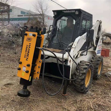 skid steer post driver pounder bobcat cat attachment|hydraulic post driver for skid steer.